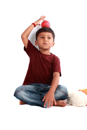 A cute Indian boy in a playful mood.の写真素材