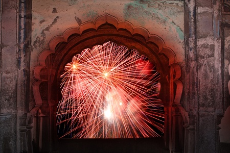 A view of traditional fireworks from the window of an ancient temple in India on the occassion of...