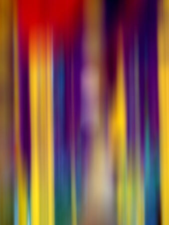 A background with stripes in bright blurred colorful patternの写真素材