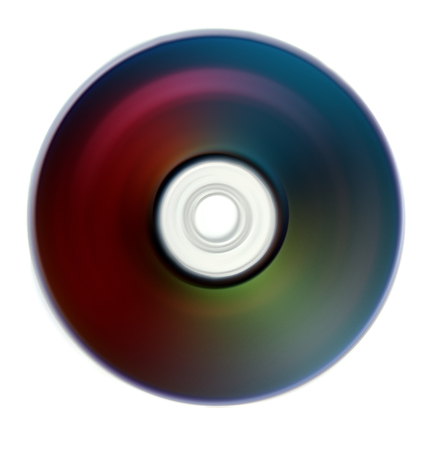 A metaphorical image of a spinning compact disc or DVD on an isolated white studio background.の写真素材