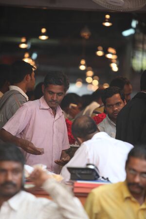 Pune, India - October 21, 2015: People crowded at a flower market during Indian festival Dassera.のeditorial素材