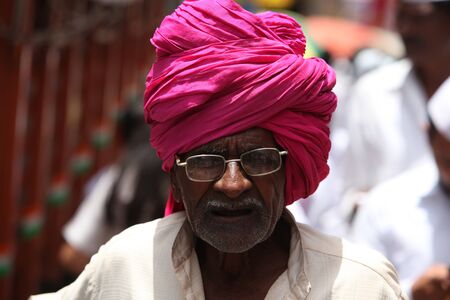 Pune, India - July 11, 2015: An old Indian pilgrim with a traditional headgearのeditorial素材