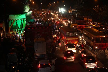 Pune, India - September 27, 2015: Ganesh festival crowds on last day causing traffic jams in India.のeditorial素材