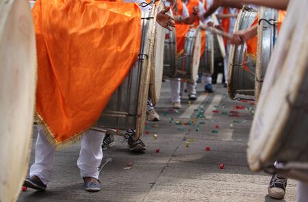 Traditional percussion instruments caled Dhol been played uring a Ganesh festival procession in India.の写真素材