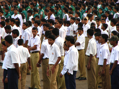 Indian school children gathered on a ground for a functionのeditorial素材