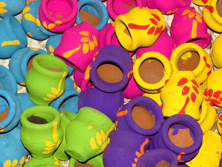Colorful pots used traditionally for Diwali festival in India during Laxmipujan.の写真素材