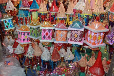 Beautiful traditional Diwali lanterns made of beads and colorful threads in a workshop.の写真素材