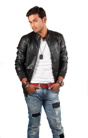 A smart handsome Indian model in leather jacket, on white studio background.の写真素材