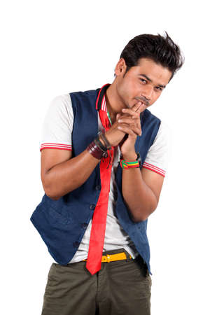 A stylish Indian young male model, on white studio background.の写真素材