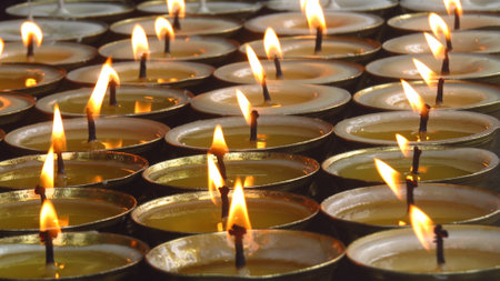 Candles in a Buddhist temple in Kathmandu, Nepal.の写真素材