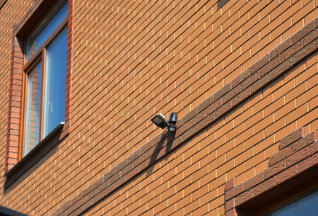 Motion Flood LED Light on House Brick Wall Outdoor. How to Choose and Install Motion Detector...