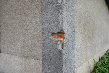 Fixing, Repair House Facade Wall Cracks. Cracking In House Facade Concrete Wall Outdoor. Cracked...