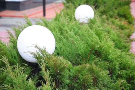 House garden glowing spheres light. Exterior House lighting. Outdoor Lighting & Exterior Light Fixtures.の写真素材