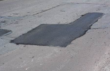 Asphalt pavement. Road Pavers, New Asphalt Laid Down. Asphalt paving - New road construction.の写真素材