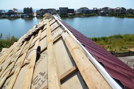 KYIV, UKRAINE - September, 05, 2017:  Metal roofing construction. Install metal roof.のeditorial素材