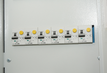 Close up on two-pole, or double-pole, residual-current device. A residual-current device (RCD), or...