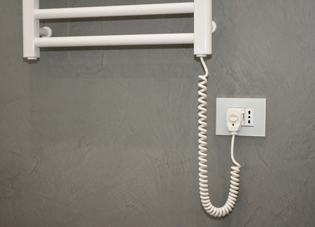 Electric Towel Rails with Thermostat. Electric Towel Rails & Bathroom Radiator switched on.