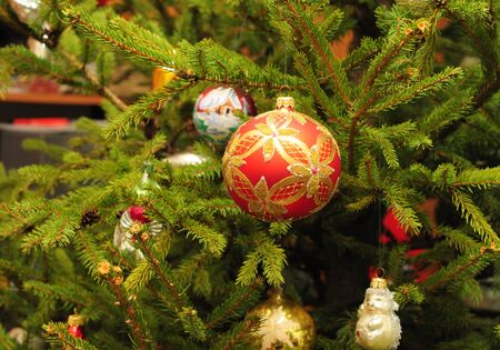 Merry Christmas Colorful Balls on the evergreen tree as a Holidays Background. Vintage Christmas Decoration - Christmas Ballsの写真素材