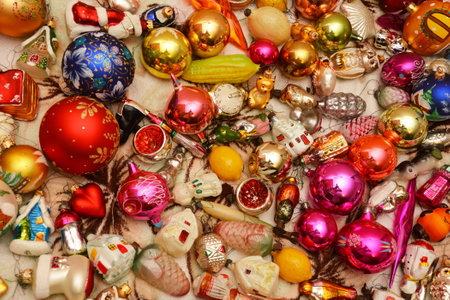 Christmas tree glass ornaments background. A close-up of a Christmas multi colored old and new...