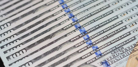 One hundred dollars bills, banknotes of the United States background. Money, American dollars...