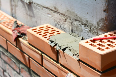 Close up on house construction wall with ceramic bricks.の写真素材