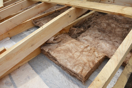 Roof insulation. House roof insulation with mineral wool and vapor barrierの写真素材