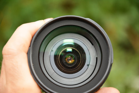 Dust inside lens. Cleaning Dust on Your DSLR Camera Lensの写真素材