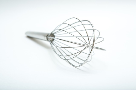 Stainless Steel Wire Whip on white backgroundの写真素材