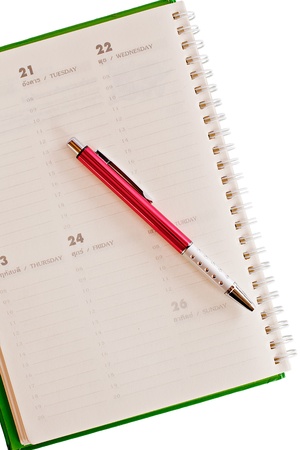 notebook and pen on white background の写真素材