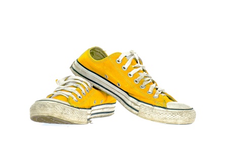 vintage yellow shoe on White  backgroundの写真素材
