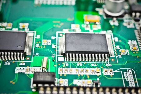 circuit board with electronic components macro backgroundの写真素材