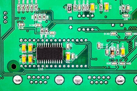 circuit board with electronic components macro background