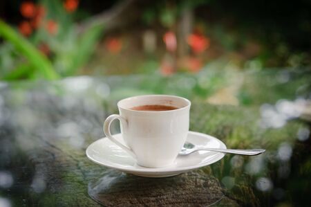 white coffee cup on tableの写真素材