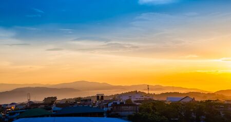 Sunset over the city, chiang rai province thailandの写真素材