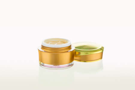 Open jar of cosmetic product on white backgroundの写真素材