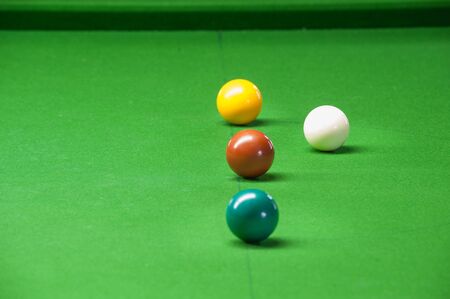 snooker ball on green surface tableの写真素材