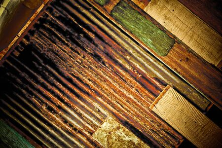 Rusty metal with colour wood for background and texture