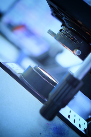 close up of microscope lens in laboratory hospitalの写真素材