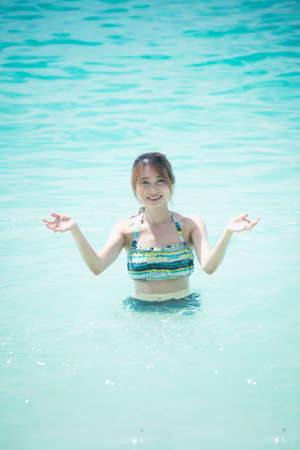 asia beautiful young woman in bikini on the beach, krabi Thailandの写真素材