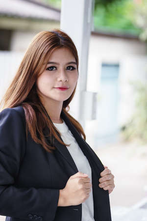 asia confident young businesswoman in suit, indoorの写真素材