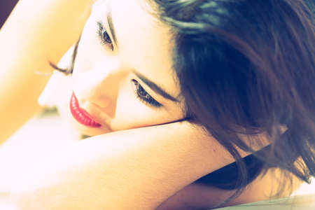 close up Asia women face lying on floor, beauty concept, vintage effectの写真素材