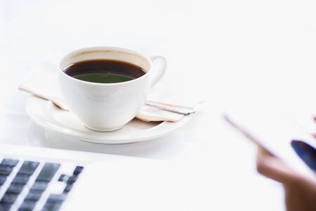 coffee  laptop and hand of business womanの写真素材