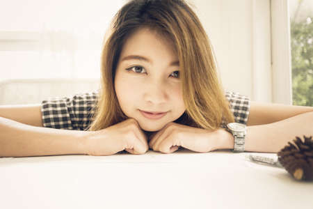portrait of asia women relax in her home, Vacations concept., vintage filter effect
