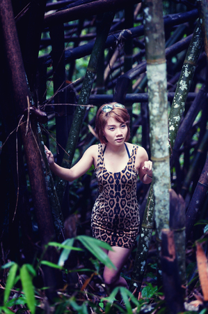 Portrait of asia sexy woman in the forestの写真素材