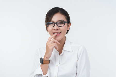 portrait of Business woman posing on whiteboard on white backgroundの写真素材