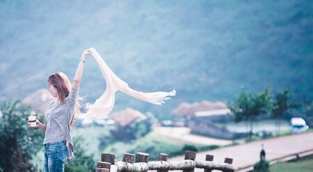 portrait of Asian tourists woman on view point at Tea garden doi angkhang Thailandの写真素材
