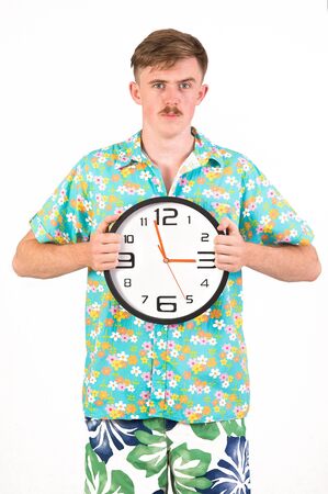 an attractive male in  colorful with clock posing on white backgroundの写真素材