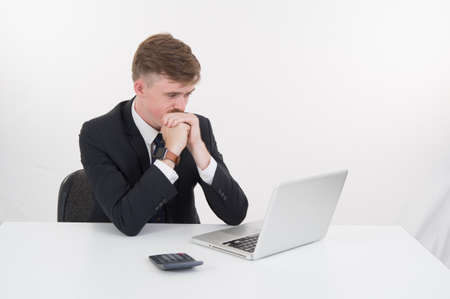 a business man with computer on white background