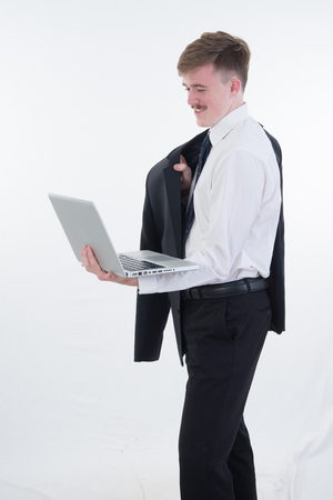 a business man with computer on white backgroundの写真素材