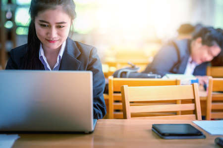 young business woman using laptop in officeの写真素材